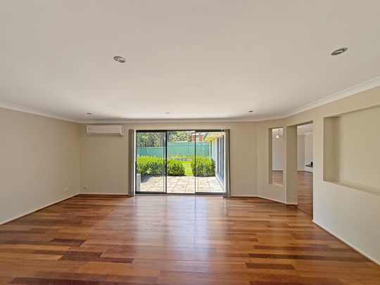 THE IDEAL FAMILY HOME IN SOUGHT-AFTER WARNERS BAY - Photo 1