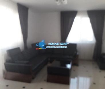 De inchiriat apartament de lux 2 camere fond nou cu parcare - Photo 1