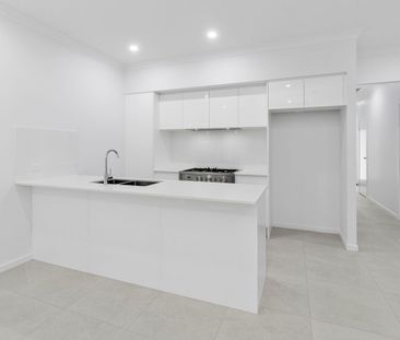 Modern & Low-Maintenance Living in Logan Reserve - Photo 4