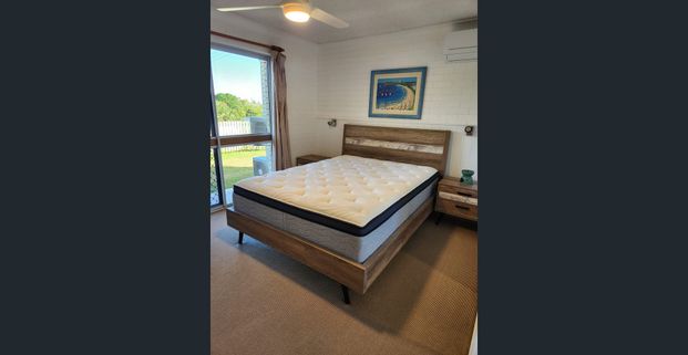 Fully furnished unit just steps from beautiful Kellys Beach - Photo 1