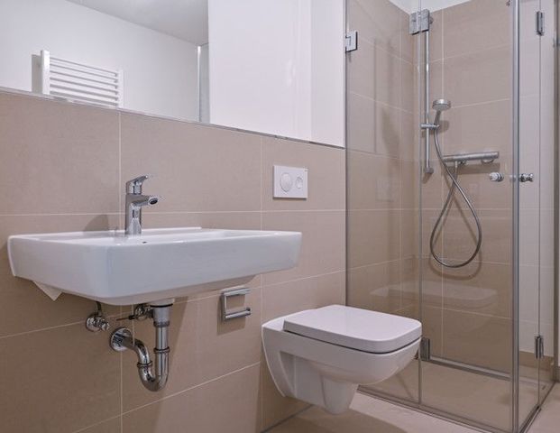 Neubau! 2-Raumwohnung im Erdgeschoß mit Terrasse! - Foto 1