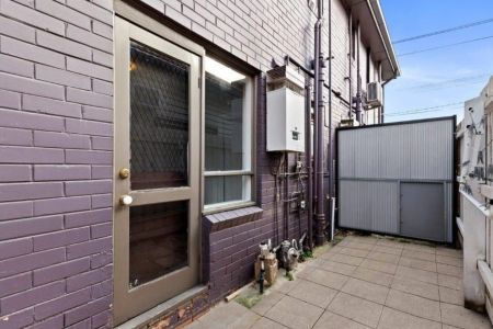 Light-Filled Apartment with Private Courtyard and Great Location! - Photo 5