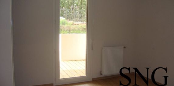 T3 AVEC JARDIN+TERRASSE+PARKINGS - Photo 2