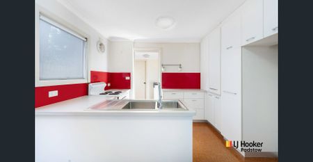 Spacious Two-Bedroom Townhouse in Peaceful, Convenient Location - Photo 4