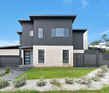 MODERN THREE-BEDROOM HOME WITH QUALITY INTERIORS - Photo 2