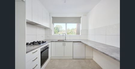 Stylish Renovated Apartment in Prime North Melbourne Location - Photo 5
