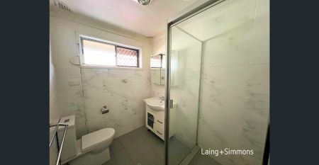 Comfortable three-bedroom home with pool - Photo 4