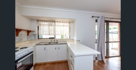 Location is everything! Available now. - Photo 4