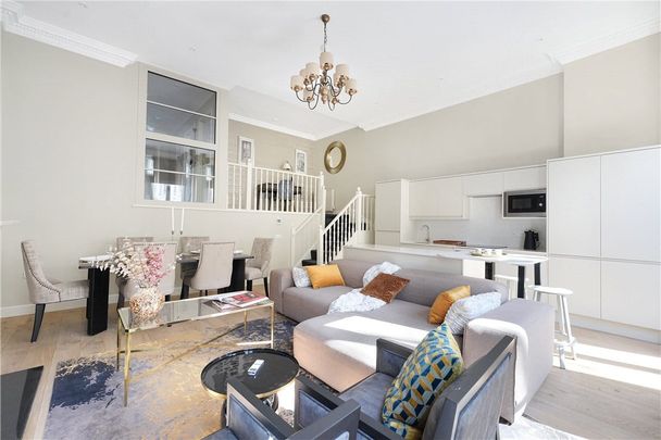 An exceptional and immaculate four bedroom splitlevel duplex situated on the favoured first and upper ground floors. It is full of period features such as the double height ceilings. Minimum Tenancy Length: 12 months EPC rating: C | Council Tax Band H - Photo 1
