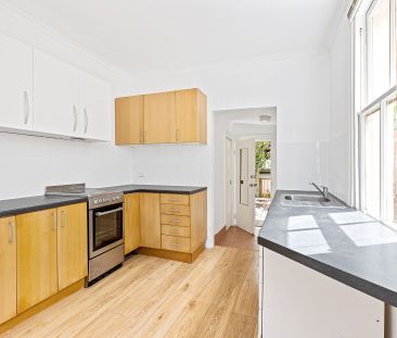 Classic Two Bedroom Semi with Rear Lane Parking - Photo 2