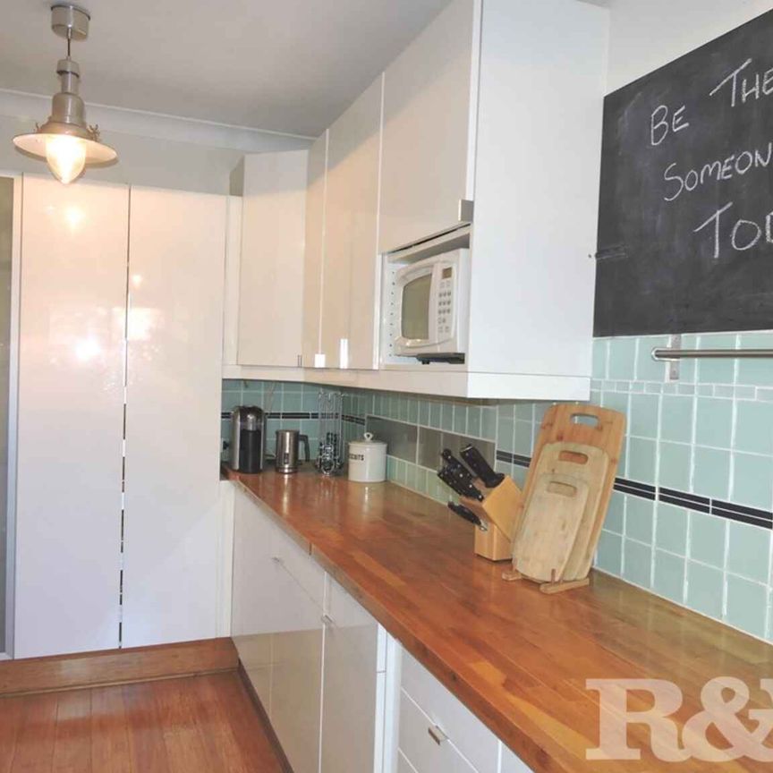 SPACIOUS TWO BEDROOM UNIT WITH COURTYARD - Photo 1