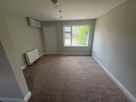 A well-presented two-bedroom home with neutral décor and village setting. - Photo 2
