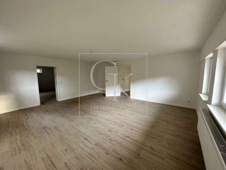 Erstbezug nach Modernisierung von geräumiger Souterrain-Wohnung (2 ZKDB) mit Terrasse und Stellplatz - Foto 2