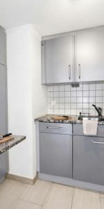 DUPLEX DE 2.5 PIÈCES AVEC POUTRES APPARENTES AU COEUR DE LA VIEILLE VILLE DE BIENNE - Photo 3