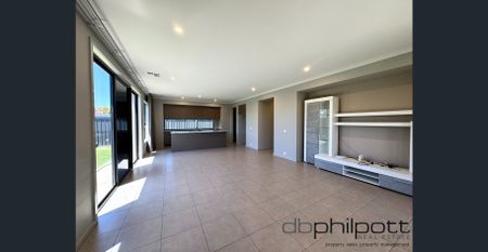 Beautiful, Modern 4-Bedroom Family Home! - Photo 4