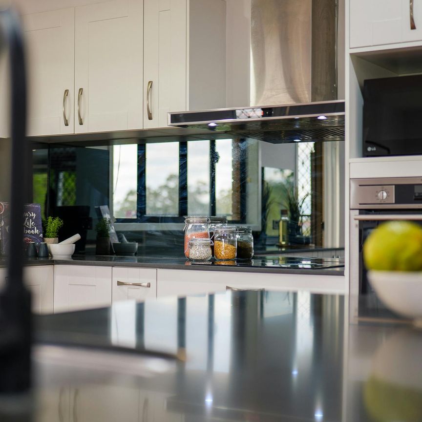 Spacious Family Home in Convenient Springwood Location - Photo 1