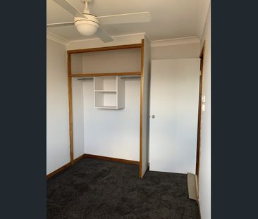 NEAT AND TIDY THREE BEDROOM HOME - Photo 2