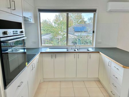 FRESHLY UPDATED AND PERFECTLY POSITIONED - Photo 5
