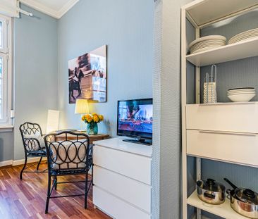 City-Residence: Individuell möbliertes Apartment in zentraler Lage - Foto 1