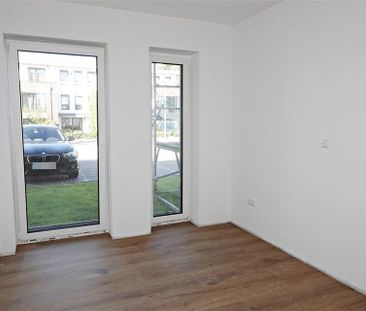Ansprechende Neubauwohnung mit Terrasse in schöner Lage von Schortens! - Foto 2