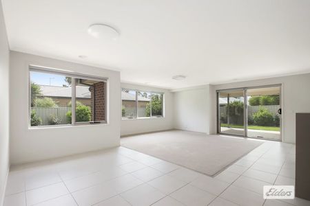 Spacious 4-Bedroom Family Home with Modern Comforts and Solar Power - Photo 2