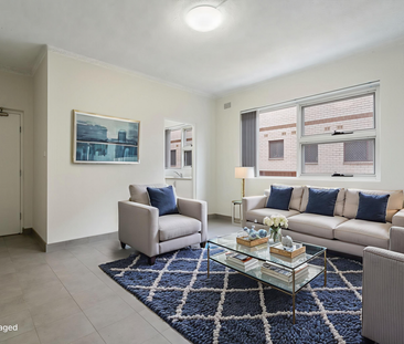 RENOVATED 2 BEDROOM UNITS WITH CAR SPACE - Photo 2