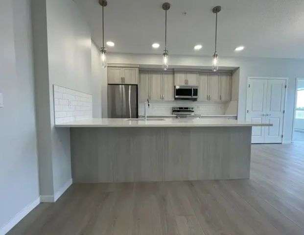 BRAND NEW! Be the first to live in this beautiful condo!!! | 4314 - 550 Belmont Drive Southwest, Calgary - Photo 1