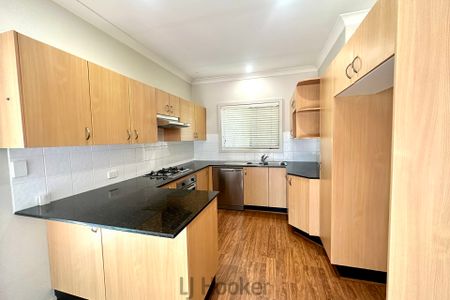 TOWNHOUSE LIVING WITH PRIVACY AND PLENTY OF SPACE - Photo 2