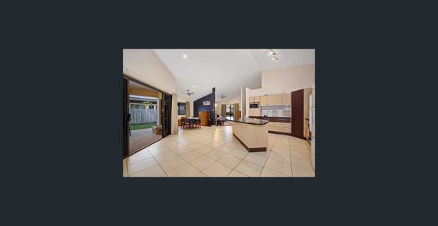 Large & Modern Family Home Situated in the Heart of Mount Louisa! - Photo 1