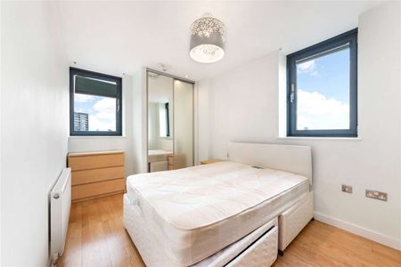 This property is conveniently situated in zone 2, providing excellent transportation connections to central London, with easy access to All Saints DLR station nearby. - Photo 2