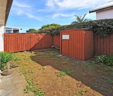 Two-Bedroom Unit with Garage and Private Backyard - Photo 2