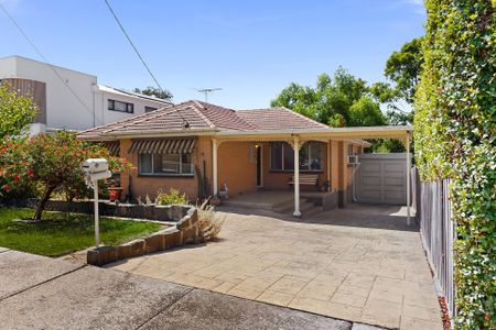 Versatile Three Bedroom Home with Multiple Living Zones - Photo 4