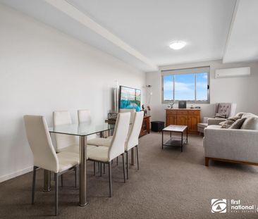 Convenient and contemporary living! - Photo 1