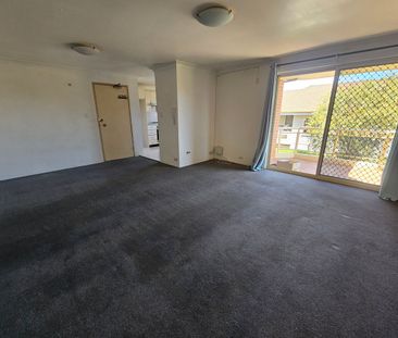 MODERN TWO BEDROOM APARTMENT IN A GATED COMMMUNITY - Photo 3