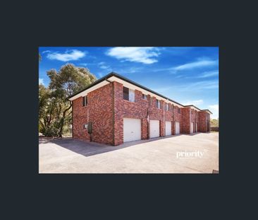 Conveniently Located Unfurnished Two Bedroom Unit - Photo 2