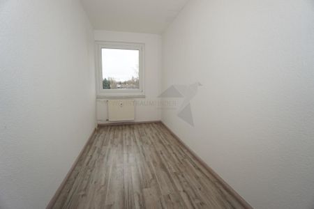 Gemütliche 3-Zimmer-Wohnung mit Balkon in ruhiger, grüner Lage - Foto 3