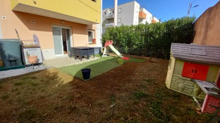 Appartement T3 RDC Avec Terrasse Jardin et Place de Parking Superficie 55 m2 - Photo 5