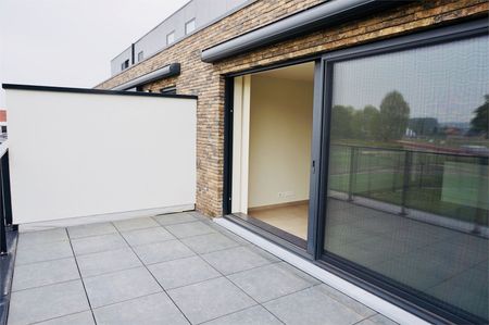 Nieuwbouwappartement met 2 slaapkamers en autostaanplaats in het centrum van Betekom. - Photo 2