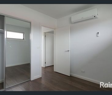 Modern Living in a Thriving Location! - Photo 3