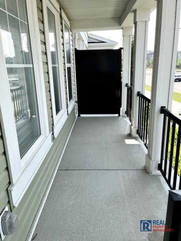 10799 Cityscape Drive NE | Townhouse | 3-bedroom, 2.5-bathroom | Double Garage - Photo 4