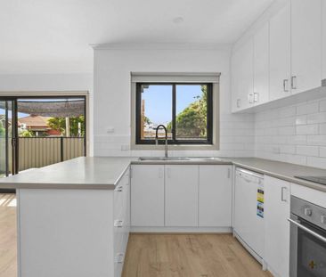 FULLY RENOVATED | PRIME LOCATION | BAYSIDE LIVING - Photo 2