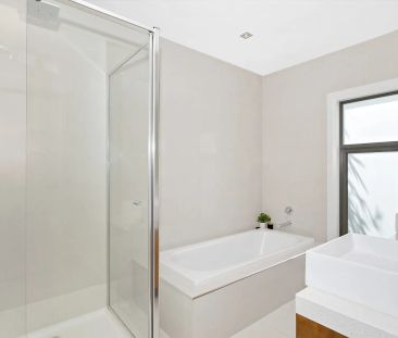 Striking Style, Sophisticated Living - Spacious Three-Level Townhouse! - Photo 4