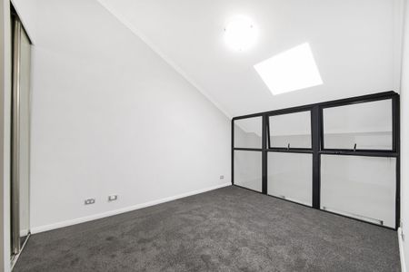 Dual-Level Boutique Loft Apartment - Photo 4