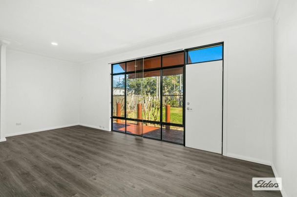 Renovated Home with 4 Car Garage + separate teenagers retreat - Photo 1