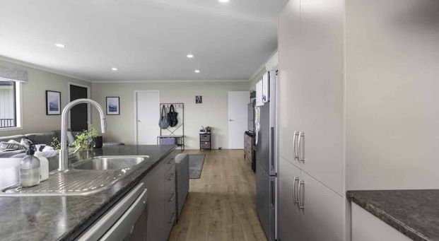 Sun-Filled 4-Bedroom Home with Modern Comforts - Photo 1