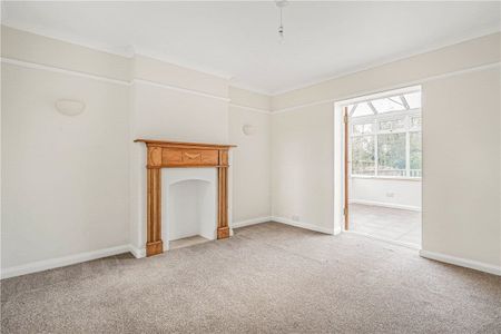 Wychwood is a detached four bedroom family home in South Heath, with a gravel driveway and well proportioned gardens to the front and rear. - Photo 2