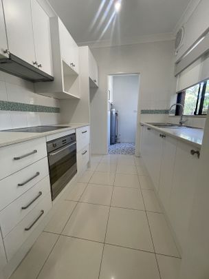 BRIGHT RENOVATED 2 BEDROOM TOP FLOOR UNIT - Photo 1