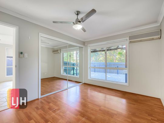 GREAT AIR CONDITIONED FOUR BEDROOM LOW SET HOME! - Photo 1