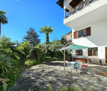Wohnung in Villa: Erdgeschoss mit Kamin, Sitzplatz und Seeblick - Foto 3