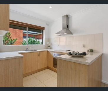 Well-Maintained Two-Bedroom Unit - Photo 6